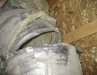 Attic duct that is broken allowing cool air and warm air to enter the attic instead of the living area of the home.